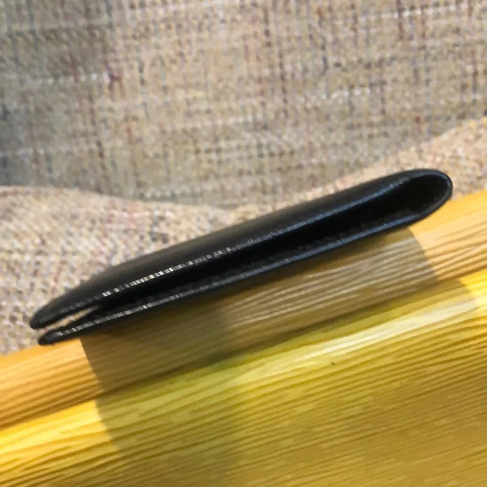 LOUIS VUITTON Black Taiga Leather Long Thin Bifold CC Wallet MI0025